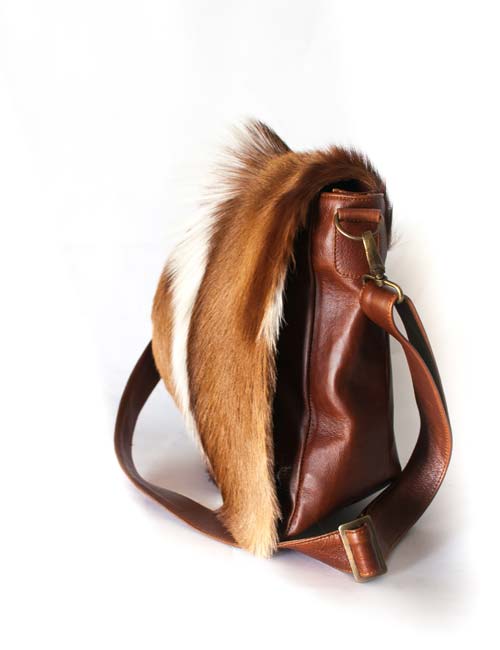 Ross  Zebra leather unisex sling bag - Modern & Tribal